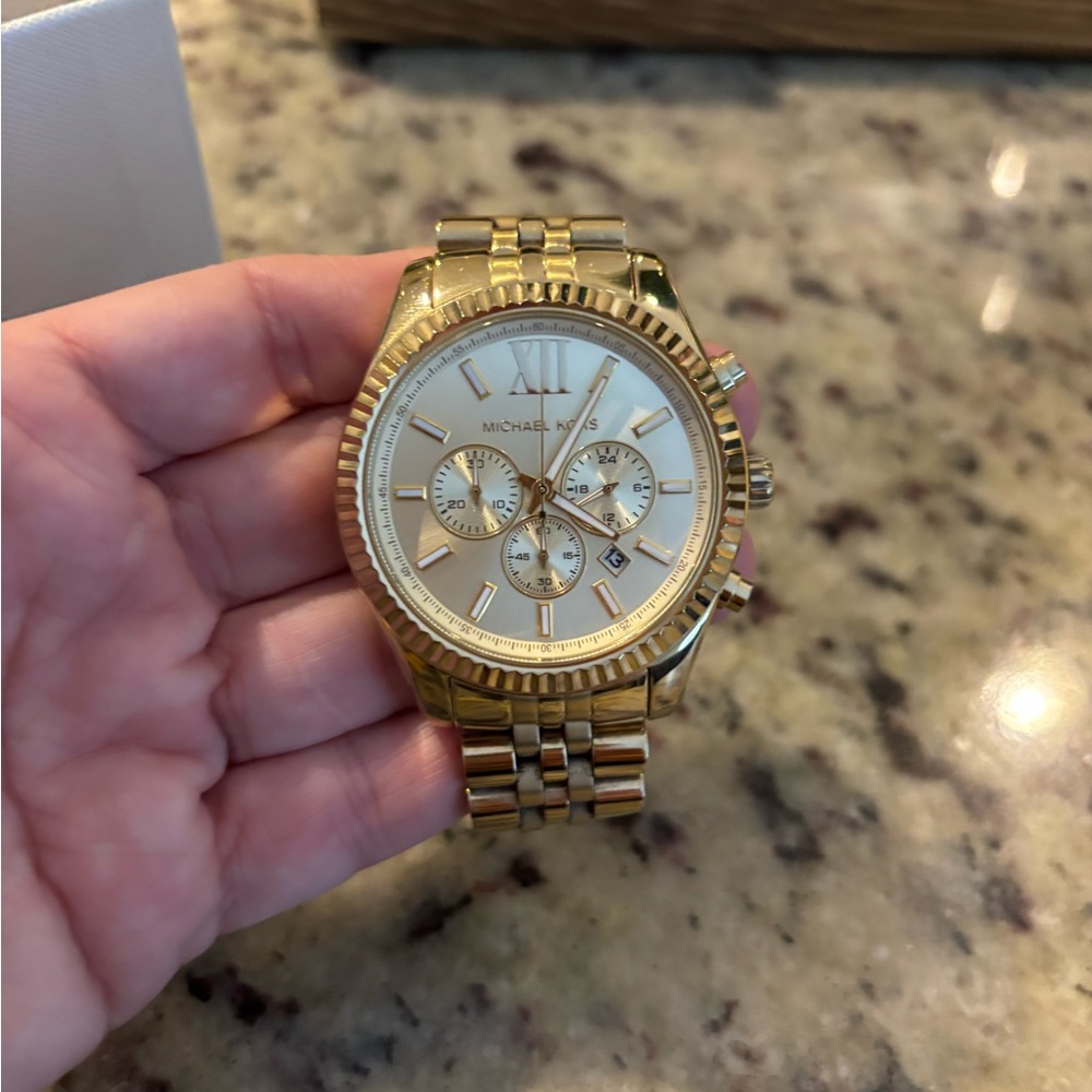 Gold MK watch